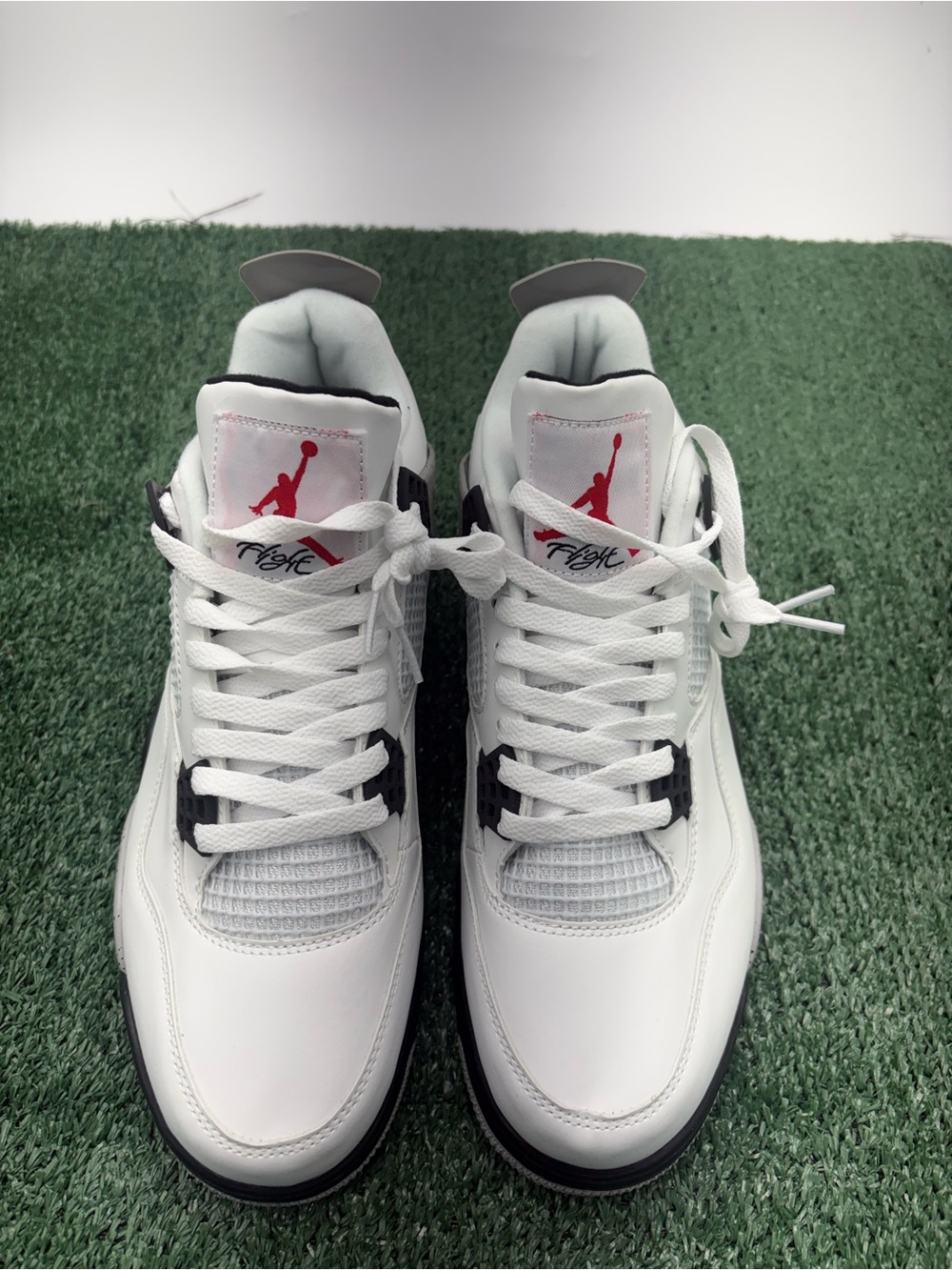 Jordan Men’s White & Black Retro Basketball Sneakers with Red Logo